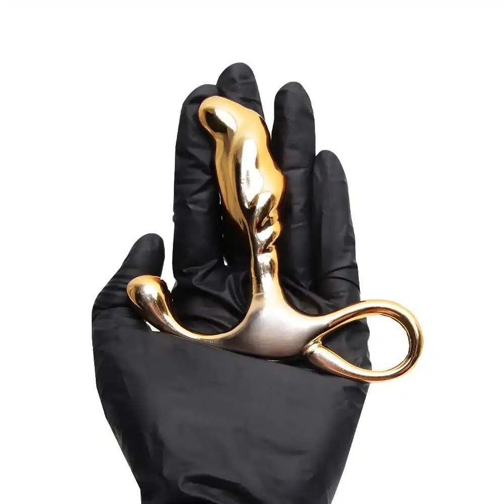 Massageador de próstata em metal com formato ergonômico e alça de segurança  6,5 x 1,9 cm | cor: dourado  Hard  Imagem 4